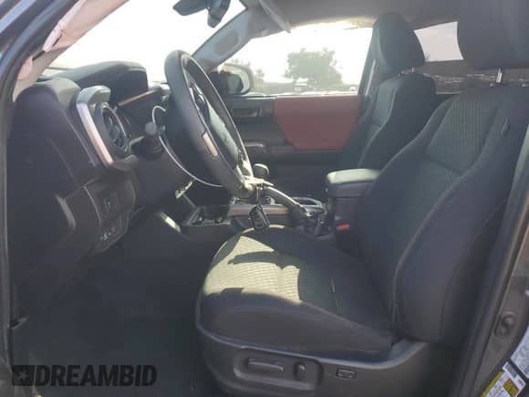 2022 Toyota Tacoma SR5 with VIN 3TMAZ5CN1NM186280, listed as a Copart auction lot 86409735 with 38,852 mi miles and Salvage title. Bid and sale history available at DreamBid. Image 7.