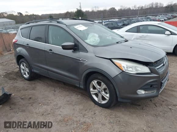 ✅ 2014 Ford Escape SE • VIN: 1FMCU9G9XEUA97228 • Lot: 43735063. Listed on IAAI with 180,870 mi. Free auction sales archive from the USA and detailed vehicle history report at DreamBid. Image 1.