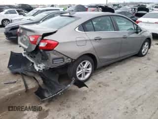 ✅ 2018 Chevrolet Cruze LT • VIN: 1G1BE5SM4J7184979 • Lot: 71338882. Wystawiony na Copart z przebiegiem 63 018 mil mil. Skorzystaj z bezpłatnego archiwum sprzedaży aukcyjnych z USA i zobacz szczegółowy raport historii pojazdu na DreamBid. Zdjęcie 3.
