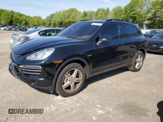 ✅ 2012 Porsche Cayenne S Hybrid • VIN: WP1AE2A22CLA91016 • Lot: 54787244. Listed on Copart with 128,844 mi. Free auction sales archive from the USA and detailed vehicle history report at DreamBid. Image 1.