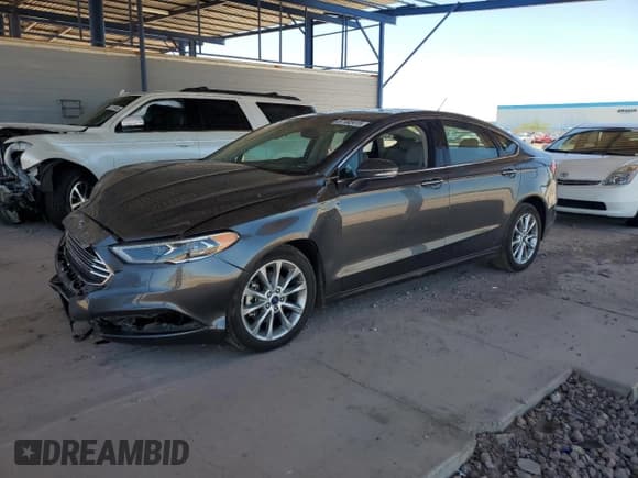✅ 2017 Ford Fusion SE • VIN: 3FA6P0HD4HR341870 • Лот: 57182415. Опубликован ранее на Copart с пробегом 86 670 миль. Бесплатный доступ к архиву аукционных продаж из США и подробный отчёт об истории автомобиля на DreamBid. Изображение 1.