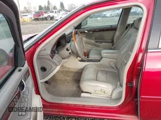 ✅ 2003 Cadillac DeVille DTS • VIN: 1G6KF57983U204070 • Lot: 43715931. Wystawiony na IAAI z przebiegiem 147 472 mil. Bezpłatny archiwum sprzedaży aukcyjnych z USA i szczegółowy raport historii pojazdu na DreamBid. Zdjęcie 5.