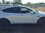 ✅ 2023 Tesla Model Y Long Range • VIN: 7SAYGDEE4PA070722 • Lot: 43324153. Listed on IAAI with Not provided. Free auction sales archive from the USA and detailed vehicle history report at DreamBid. Image 14.