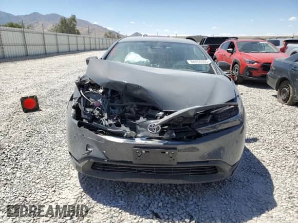 2025 Toyota Prius LE z VIN JTDACAAU1S3062446, wystawiony jako Copart lot #66959305 z przebiegiem Nie podano mil oraz Szkoda całkowita • Salvage title. Historia ofert i sprzedaży dostępna na DreamBid. Obrazek 5.