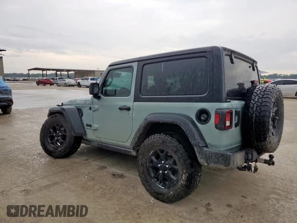 ✅ 2023 Jeep Wrangler Sport • VIN: 1C4HJXAG1PW615202 • Lot: 68663635. Listed on Copart with 73,935 mi. Free auction sales archive from the USA and detailed vehicle history report at DreamBid. Image 2.