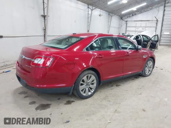 ✅ 2010 Ford Taurus Limited • VIN: 1FAHP2JW7AG134788 • Lot: 43124152. Listed on IAAI with 157,106 mi. Free auction sales archive from the USA and detailed vehicle history report at DreamBid. Image 4.