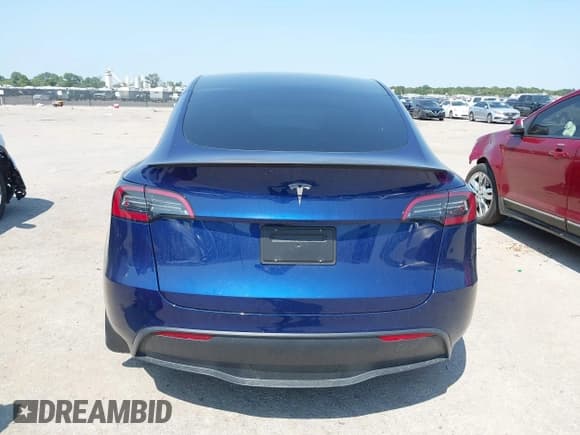✅ 2023 Tesla Model Y Long Range • VIN: 7SAYGAEE2PF969953 • Lot: 43163995. Listed on IAAI with 23,353 mi. Free auction sales archive from the USA and detailed vehicle history report at DreamBid. Image 16.