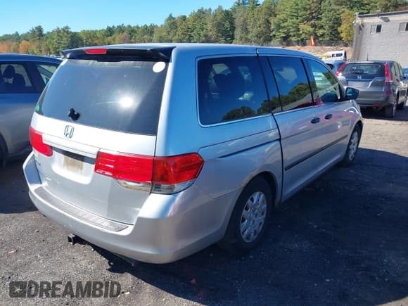 ✅ 2010 Honda Odyssey LX • VIN: 5FNRL3H23AB015696 • Lot: 43404697. Listed on IAAI with 195,124 mi. Free auction sales archive from the USA and detailed vehicle history report at DreamBid. Image 4.