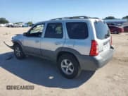 ✅ 2006 Mazda Tribute i • VIN: 4F2YZ02ZX6KM02402 • Lot: 82350335. Listed on Copart with 175,652 mi. Free auction sales archive from the USA and detailed vehicle history report at DreamBid. Image 2.