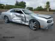 2009 Dodge Challenger SE with VIN 2B3LJ44V09H632935, listed as a Copart auction lot 72086674 with 64,028 mi miles and Salvage title. Bid and sale history available at DreamBid. Image 4.