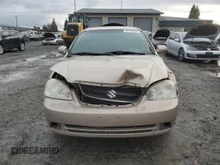 ✅ 2007 Suzuki Forenza • VIN: KL5JD56Z07K657218 • Lot: 86767854. Wystawiony na Copart z przebiegiem 93 044 mil. Bezpłatny archiwum sprzedaży aukcyjnych z USA i szczegółowy raport historii pojazdu na DreamBid. Zdjęcie 5.