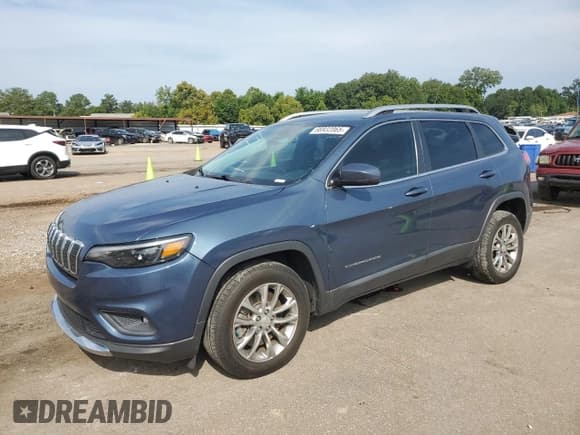 ✅ 2020 Jeep Cherokee Altitude • VIN: 1C4PJLLB4LD653986 • Lot: 66932065. Listed on Copart with 99,629 mi. Free auction sales archive from the USA and detailed vehicle history report at DreamBid. Image 1.