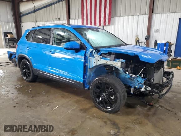 ✅ 2023 Volkswagen Taos SE • VIN: 3VVNX7B22PM313990 • Lot: 71677655. Listed on Copart with 21,893 mi. Free auction sales archive from the USA and detailed vehicle history report at DreamBid. Image 4.