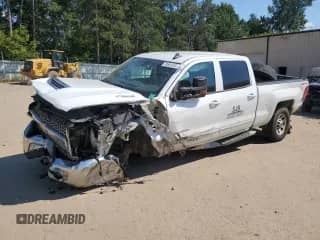 2019 Chevrolet Silverado 2500HD LT с VIN 1GC1KSEY2KF242460, выставлен на аукционе Copart как лот 70551245 с пробегом 144 077 миль миль и Списание • Salvage title. История ставок и продаж доступна на DreamBid. Изображение 1.