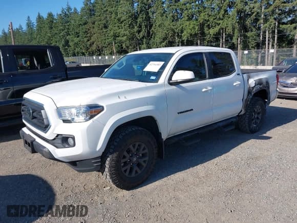 ✅ 2023 Toyota Tacoma SR5 • VIN: 3TMAZ5CN6PM216859 • Лот: 42716585. Опубликован ранее на IAAI с пробегом 15 750 миль. Бесплатный доступ к архиву аукционных продаж из США и подробный отчёт об истории автомобиля на DreamBid. Изображение 2.