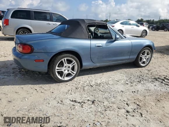 ✅ 2005 Mazda MX-5 Miata Cloth • VIN: JM1NB353250410343 • Лот: 73766474. Опубликован ранее на Copart с пробегом Не указан. Бесплатный доступ к архиву аукционных продаж из США и подробный отчёт об истории автомобиля на DreamBid. Изображение 3.