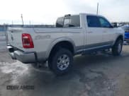 ✅ 2022 Ram 2500 Laramie • VIN: 3C6UR5FLXNG105323 • Lot: 41359667. Listed on IAAI with 33,266 mi. Free auction sales archive from the USA and detailed vehicle history report at DreamBid. Image 4.