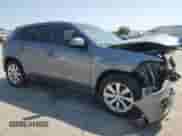 2015 Mitsubishi Outlander ES with VIN 4A4AP3AU2FE022752, listed as a Copart auction lot 71730925 with 212,695 mi miles and Salvage title. Bid and sale history available at DreamBid. Image 4.