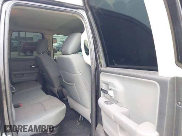 2018 Ram 1500 SLT with VIN 1C6RR6GG9JS169241, listed as a IAAI auction lot 42498561 with 77,075 mi miles and . Bid and sale history available at DreamBid. Image 8.