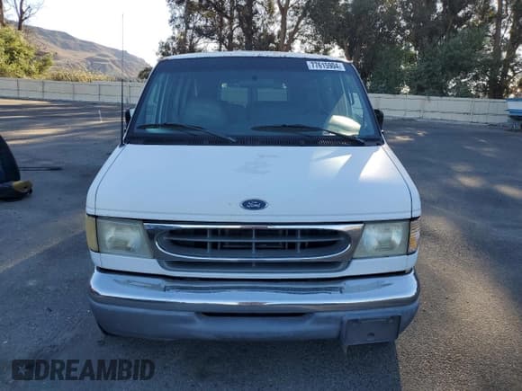 ✅ 2000 Ford Econoline Passenger XL • VIN: 1FBSS31L3YHB98619 • Lot: 77615904. Listed on Copart with 316,815 mi. Free auction sales archive from the USA and detailed vehicle history report at DreamBid. Image 5.