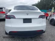 ✅ 2023 Tesla Model Y Long Range • VIN: 7SAYGAEEXPF647352 • Lot: 41955933. Listed on IAAI with Not provided. Free auction sales archive from the USA and detailed vehicle history report at DreamBid. Image 17.