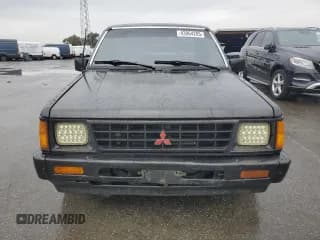 ✅ 1991 Mitsubishi Mighty Max • VIN: JA7FL25W7MP028365 • Lot: 43964285. Wystawiony na Copart z przebiegiem 175 102 mil. Bezpłatny archiwum sprzedaży aukcyjnych z USA i szczegółowy raport historii pojazdu na DreamBid. Zdjęcie 5.