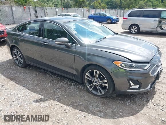 ✅ 2020 Ford Fusion Titanium • VIN: 3FA6P0D97LR116854 • Lot: 43081513. Listed on IAAI with 97,625 mi. Free auction sales archive from the USA and detailed vehicle history report at DreamBid. Image 1.