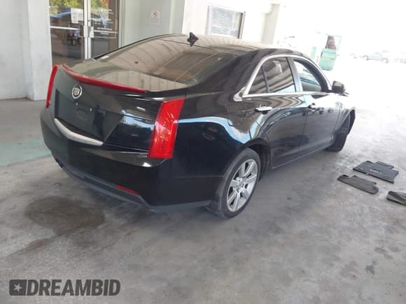 ✅ 2014 Cadillac ATS Standard RWD • VIN: 1G6AA5RA0E0171142 • Lot: 42871265. Listed on IAAI with 137,329 mi. Free auction sales archive from the USA and detailed vehicle history report at DreamBid. Image 4.