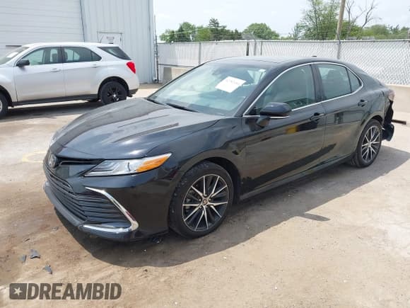 ✅ 2024 Toyota Camry XLE • VIN: 4T1F11BK0RU112469 • Lot: 42382184. Listed on IAAI with 57,831 mi. Free auction sales archive from the USA and detailed vehicle history report at DreamBid. Image 2.