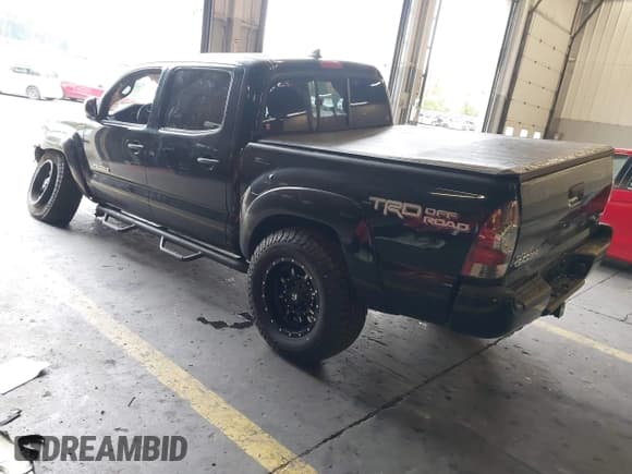 ✅ 2014 Toyota Tacoma • VIN: 3TMLU4ENXEM143779 • Lot: 43475792. Listed on IAAI with 156,975 mi. Free auction sales archive from the USA and detailed vehicle history report at DreamBid. Image 3.