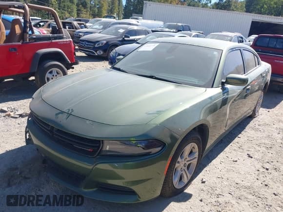 ✅ 2022 Dodge Charger SXT • VIN: 2C3CDXBGXNH176906 • Lot: 43462779. Listed on IAAI with 43,556 mi. Free auction sales archive from the USA and detailed vehicle history report at DreamBid. Image 17.