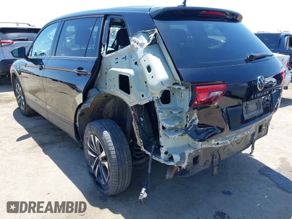 ✅ 2023 Volkswagen Tiguan S • VIN: 3VVRB7AX3PM064709 • Lot: 42103656. Listed on IAAI with 17,157 mi. Free auction sales archive from the USA and detailed vehicle history report at DreamBid. Image 3.