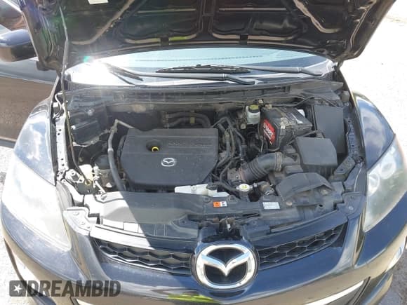 ✅ 2012 Mazda CX-7 i Touring • VIN: JM3ER2CM5C0415574 • Lot: 42263702. Wystawiony na IAAI z przebiegiem 293 566 mil. Bezpłatny archiwum sprzedaży aukcyjnych z USA i szczegółowy raport historii pojazdu na DreamBid. Zdjęcie 10.