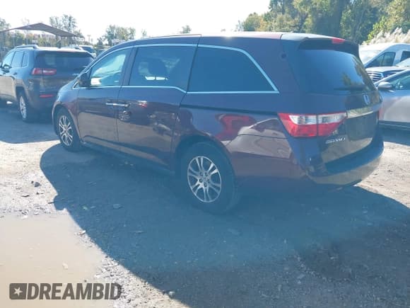 ✅ 2011 Honda Odyssey EX-L • VIN: 5FNRL5H6XBB018305 • Lot: 43509435. Listed on IAAI with 202,207 mi. Free auction sales archive from the USA and detailed vehicle history report at DreamBid. Image 3.