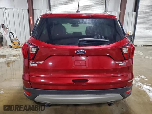 ✅ 2019 Ford Escape Titanium • VIN: 1FMCU9J93KUB85106 • Lot: 94671995. Listed on Copart with 22,727 mi. Free auction sales archive from the USA and detailed vehicle history report at DreamBid. Image 6.