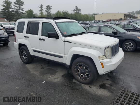 ✅ 2012 Jeep Liberty Sport Latitude • VIN: 1C4PJMAK2CW122511 • Lot: 59661495. Listed on Copart with 120,303 mi. Free auction sales archive from the USA and detailed vehicle history report at DreamBid. Image 4.