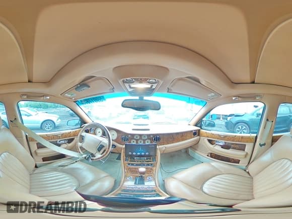 ✅ 2001 Bentley Arnage • VIN: SCBLC31E11CX06414 • Лот: 59017875. Опубликован ранее на Copart с пробегом 70 860 миль. Бесплатный доступ к архиву аукционных продаж из США и подробный отчёт об истории автомобиля на DreamBid. Изображение 14.