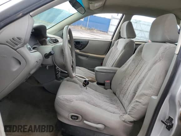 2003 Chevrolet Malibu LS with VIN 1G1NE52J23M633082, listed as a Copart auction lot 79299664 with 149,574 mi miles and Salvage title. Bid and sale history available at DreamBid. Image 7.