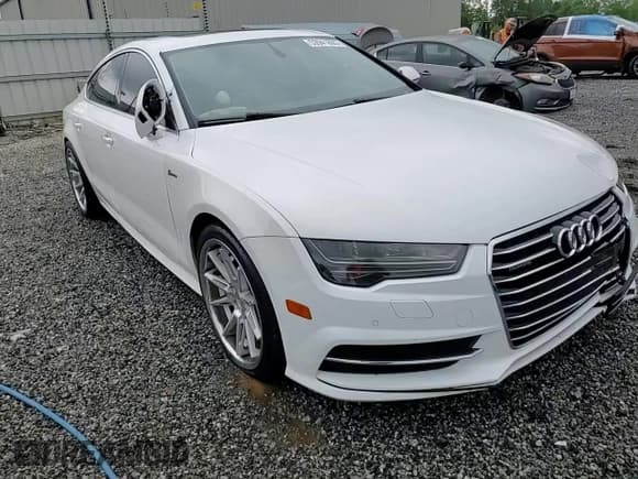 ✅ 2016 Audi A7 Premium Plus • VIN: WAUWGAFC6GN072330 • Lot: 53941805. Listed on Copart with 169,237 mi. Free auction sales archive from the USA and detailed vehicle history report at DreamBid. Image 13.