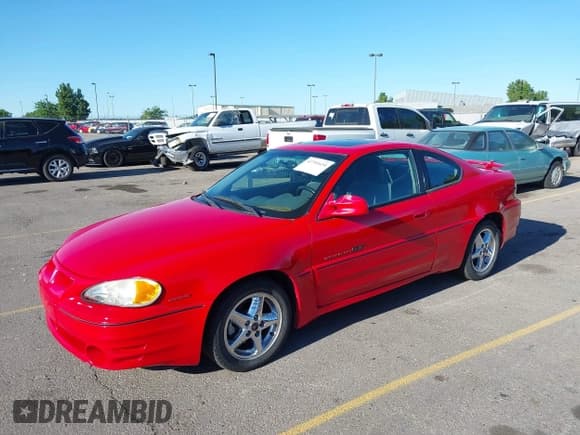 ✅ 2001 Pontiac Grand Am GT1 • VIN: 1G2NV12E61M541932 • Лот: 42701634. Опубликован ранее на IAAI с пробегом 77 435 миль. Бесплатный доступ к архиву аукционных продаж из США и подробный отчёт об истории автомобиля на DreamBid. Изображение 2.