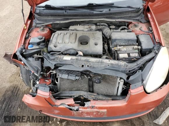 2009 Hyundai Accent Auto GS z VIN KMHCM36CX9U131345, wystawiony jako Copart lot #74927154 z przebiegiem 113 022 mil mil oraz Szkoda całkowita • Salvage title. Historia ofert i sprzedaży dostępna na DreamBid. Obrazek 13.