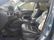 ✅ 2023 Mazda CX-5 S Carbon Edition • VIN: JM3KFBCM8P0220179 • Lot: 96040525. Wystawiony na Copart z przebiegiem 68 999 mil. Bezpłatny archiwum sprzedaży aukcyjnych z USA i szczegółowy raport historii pojazdu na DreamBid. Zdjęcie 7.