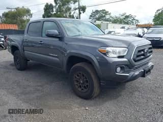 2022 Toyota Tacoma SR5 with VIN 3TYAZ5CN4NT019786, listed as a IAAI auction lot 42385567 with 8,704 mi miles and . Bid and sale history available at DreamBid. Image 1.