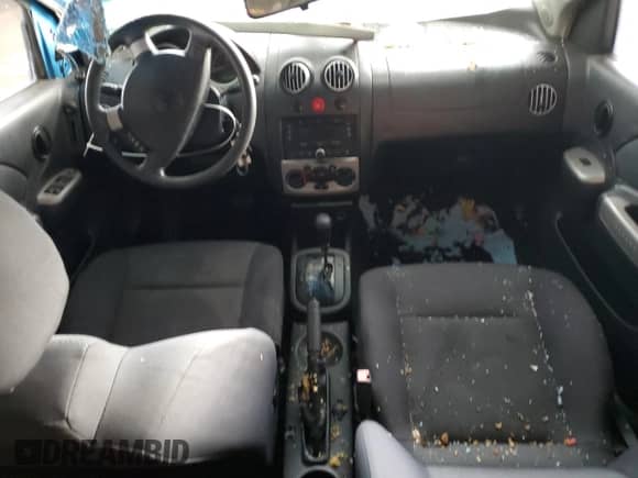 2006 Chevrolet Aveo LT z VIN KL1TG66666B653461, wystawiony jako Copart lot #71674235 z przebiegiem 151 925 mil mil oraz Szkoda całkowita • Salvage title. Historia ofert i sprzedaży dostępna na DreamBid. Obrazek 8.