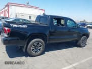 ✅ 2023 Toyota Tacoma SR • VIN: 3TMCZ5AN4PM602174 • Lot: 42851127. Listed on IAAI with 28,356 mi. Free auction sales archive from the USA and detailed vehicle history report at DreamBid. Image 14.