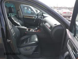 ✅ 2011 Volkswagen Touareg Sport • VIN: WVGFF9BP5BD000803 • Лот: 43596680. Опубликован ранее на IAAI с пробегом 107 740 миль. Бесплатный доступ к архиву аукционных продаж из США и подробный отчёт об истории автомобиля на DreamBid. Изображение 5.