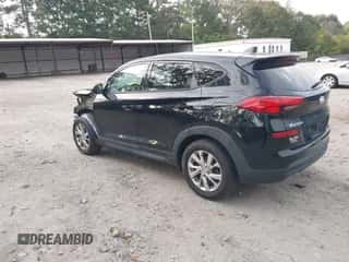 2020 Hyundai Tucson SE with VIN KM8J2CA41LU130377, listed as a IAAI auction lot 43399897 with 133,000 mi miles and . Bid and sale history available at DreamBid. Image 3.