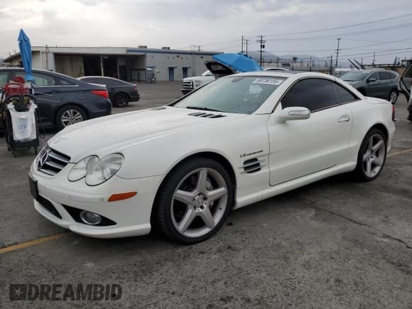 ✅ 2007 Mercedes-Benz SL 55/63 AMG • VIN: WDBSK72F47F133895 • Лот: 59736155. Опубликован ранее на Copart с пробегом 98 591 миль. Бесплатный доступ к архиву аукционных продаж из США и подробный отчёт об истории автомобиля на DreamBid. Изображение 1.