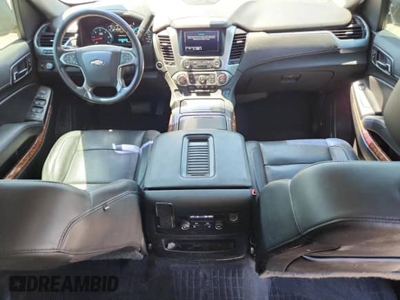 2019 Chevrolet Suburban Premier with VIN 1GNSCJKCXKR110511, listed as a Copart auction lot 71028945 with 87,669 mi miles and Salvage title. Bid and sale history available at DreamBid. Image 8.