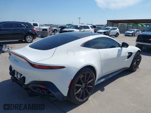 ✅ 2019 Aston Martin Vantage • VIN: SCFSMGAW4KGN01848 • Lot: 42032076. Wystawiony na IAAI z przebiegiem 54 469 mil. Bezpłatny archiwum sprzedaży aukcyjnych z USA i szczegółowy raport historii pojazdu na DreamBid. Zdjęcie 4.